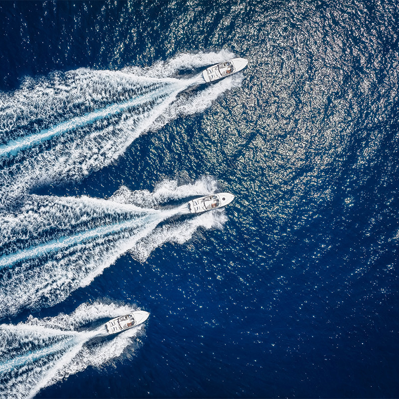 3 boats in the ocean